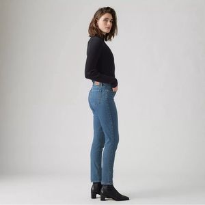 Levi 311 shaping skinny jeans, blue medium wash, size 29